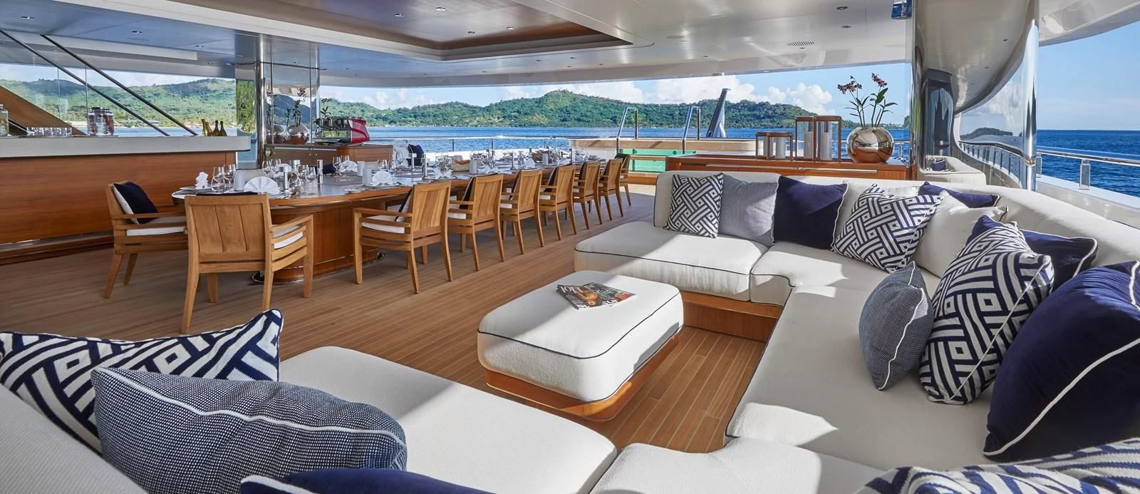a living room with a large window aboard IJE Yacht for Sale