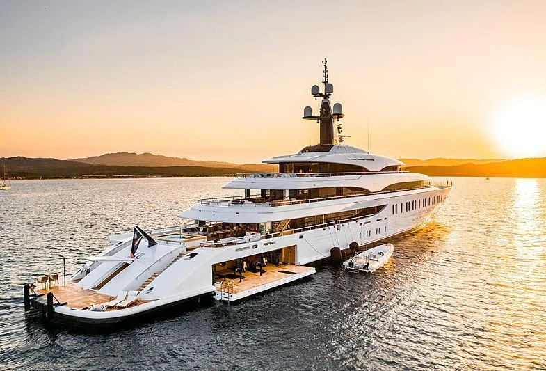 a large ship in the water aboard IJE Yacht for Sale