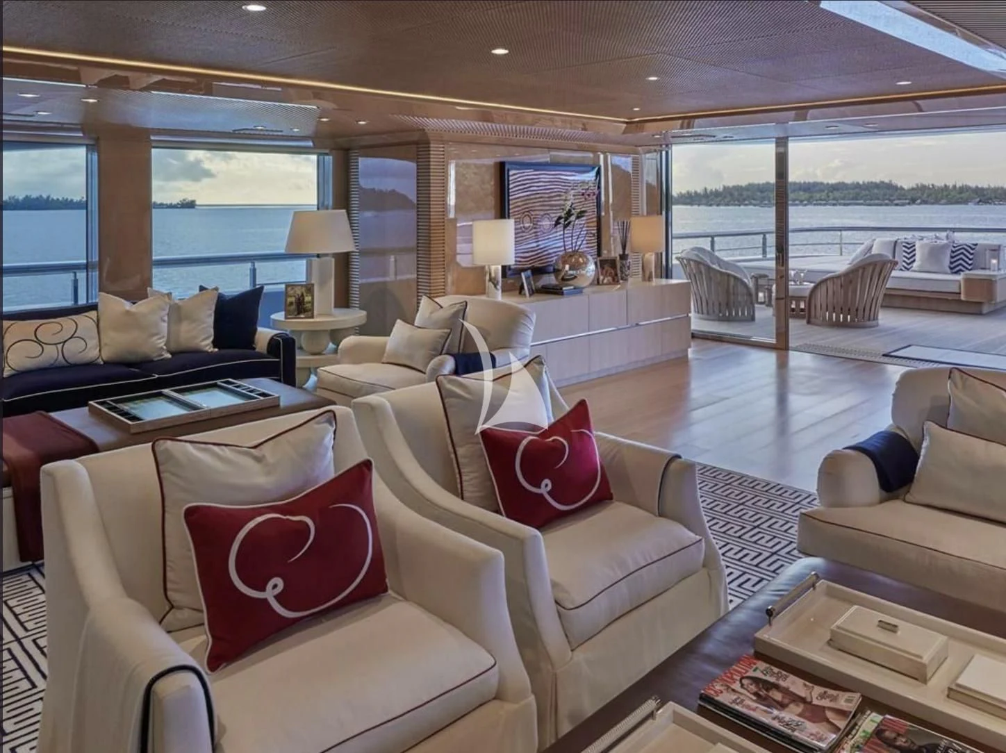 a living room with a large glass window aboard IJE Yacht for Sale