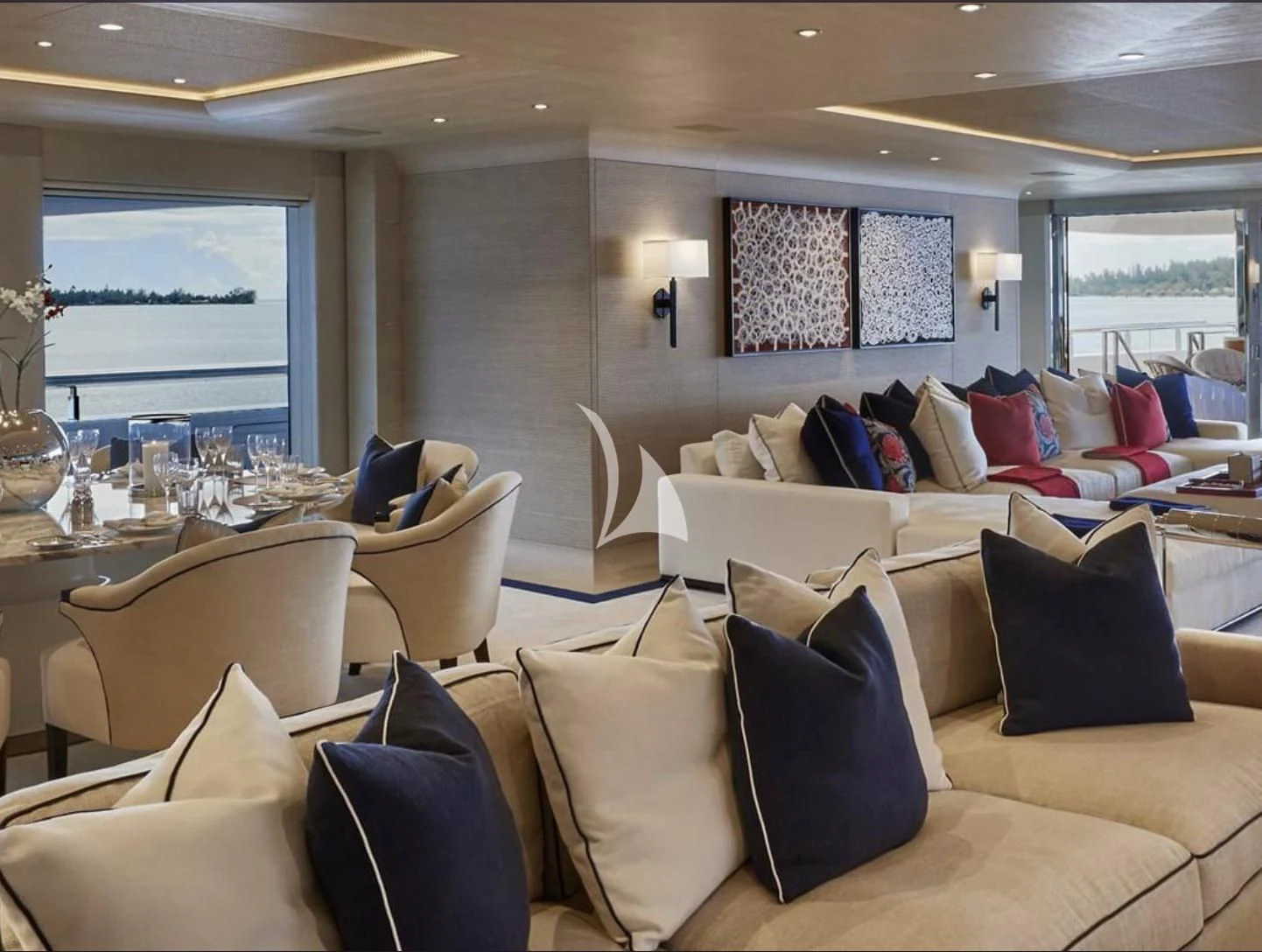 a living room with a large window aboard IJE Yacht for Sale