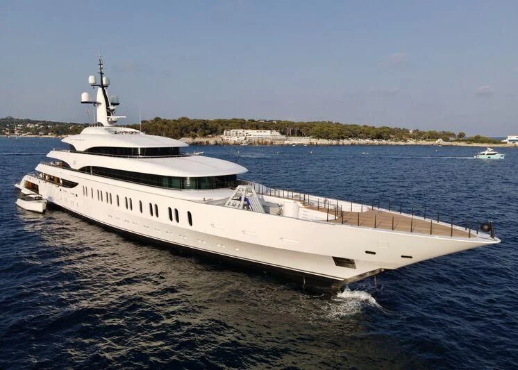 a white yacht on the water aboard IJE Yacht for Sale