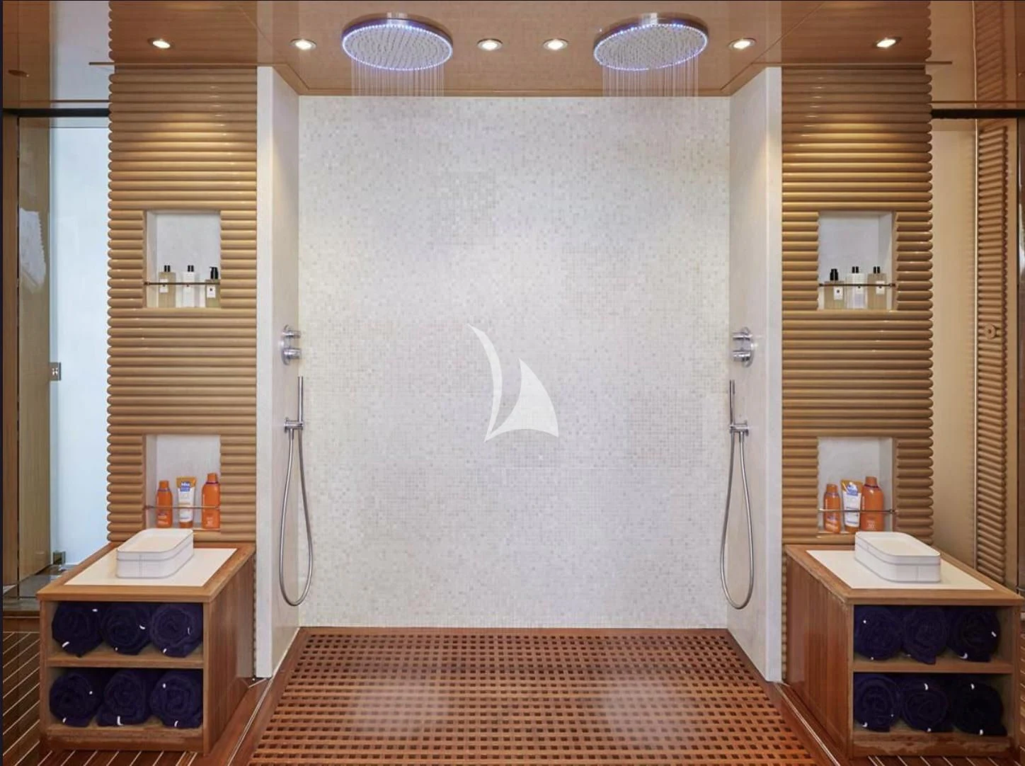 a room with a bed and a desk aboard IJE Yacht for Sale