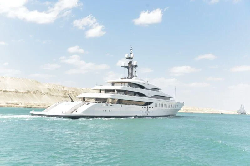 a white boat in the water aboard IJE Yacht for Sale