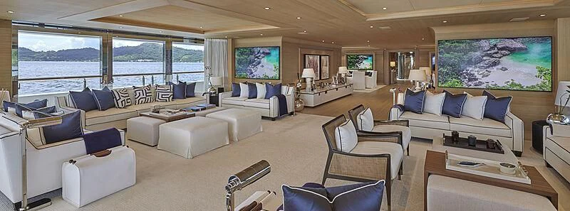 a living room with a large window aboard IJE Yacht for Sale
