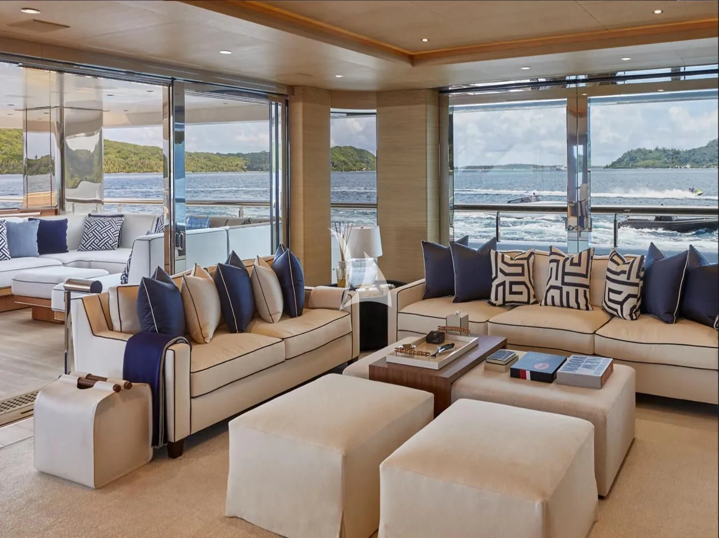 a living room with a large window aboard IJE Yacht for Sale