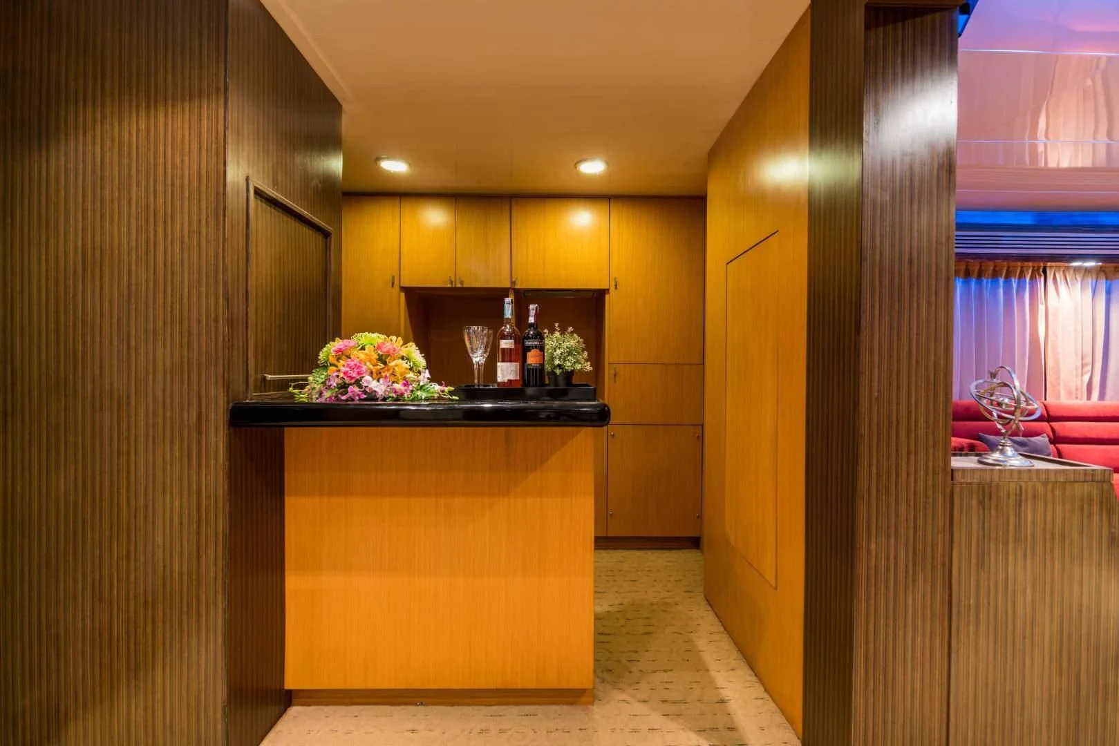 a kitchen with a counter and cabinets aboard PHATSARA Yacht for Sale