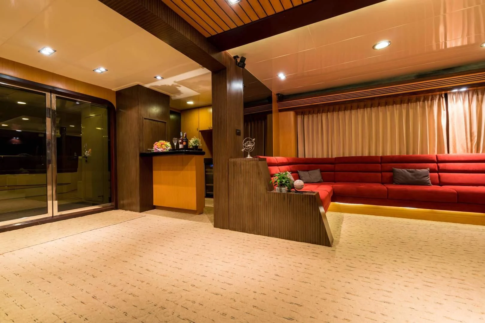 a room with couches and a table aboard PHATSARA Yacht for Sale