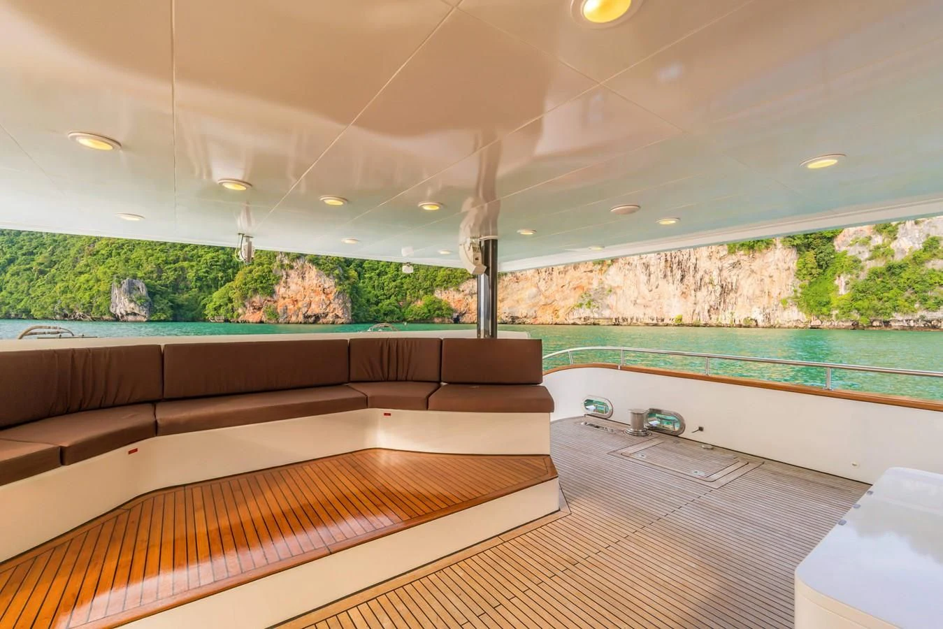 a room with a pool and a wall of trees aboard PHATSARA Yacht for Sale
