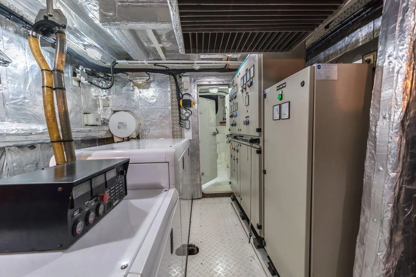 a room with a large machine aboard PHATSARA Yacht for Sale