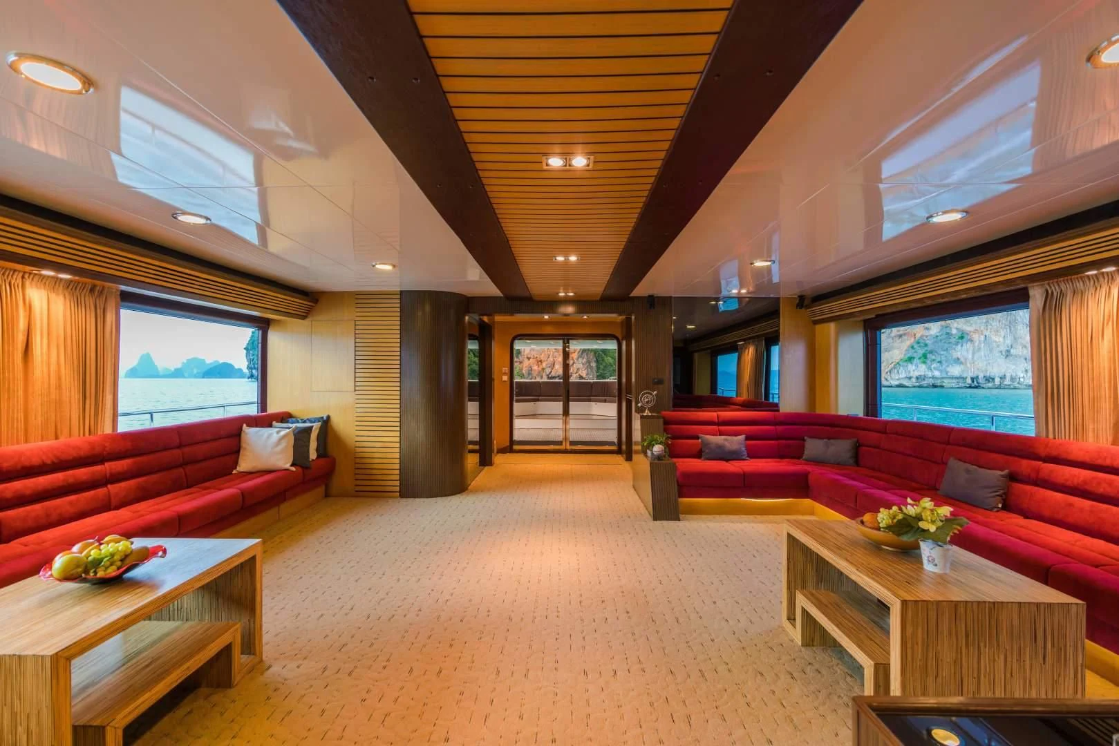 a living room with a large window aboard PHATSARA Yacht for Sale