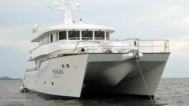 a white boat in the water aboard PHATSARA Yacht for Sale
