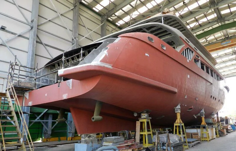 a large red submarine in a warehouse aboard COLLEZIONE 40 / 347 Yacht for Sale