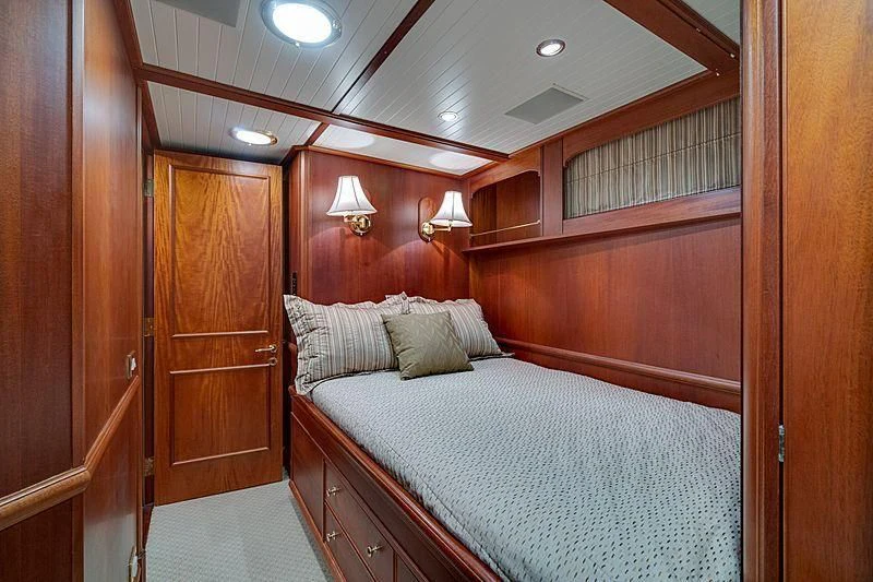 a bed in a room aboard NIRVANA Yacht for Sale