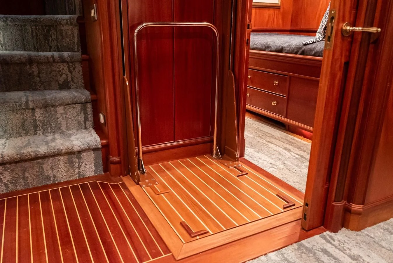 a wood door and a red door aboard NIRVANA Yacht for Sale