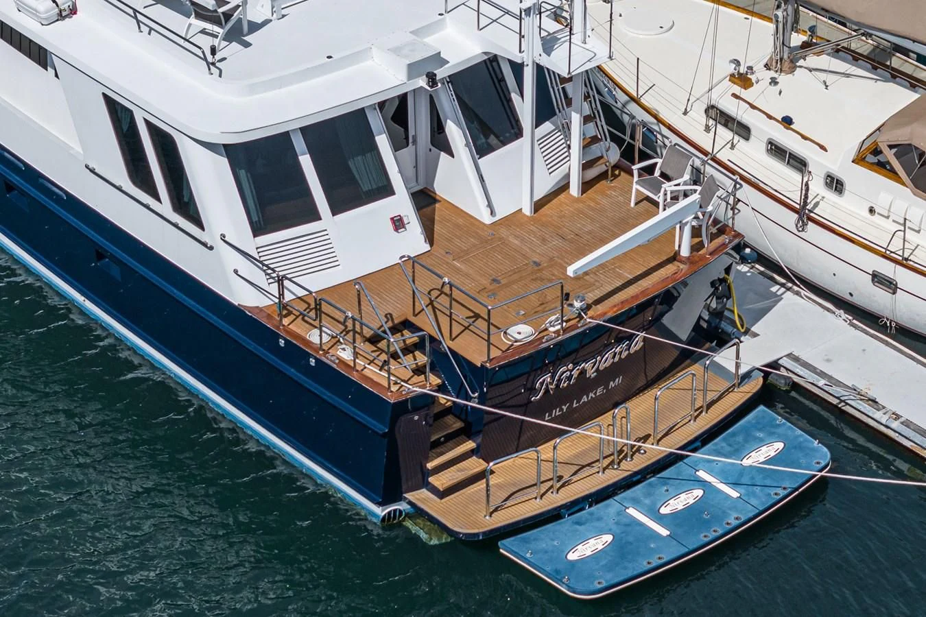a couple of boats docked aboard NIRVANA Yacht for Sale