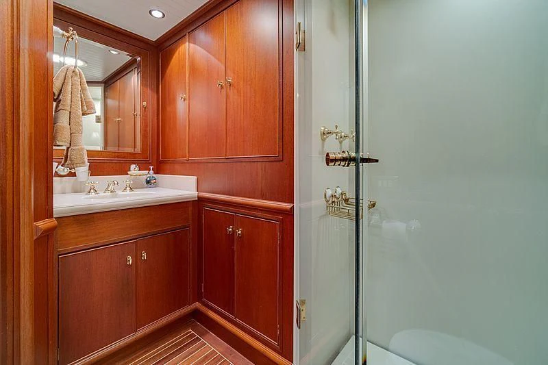 a bathroom with a glass shower aboard NIRVANA Yacht for Sale