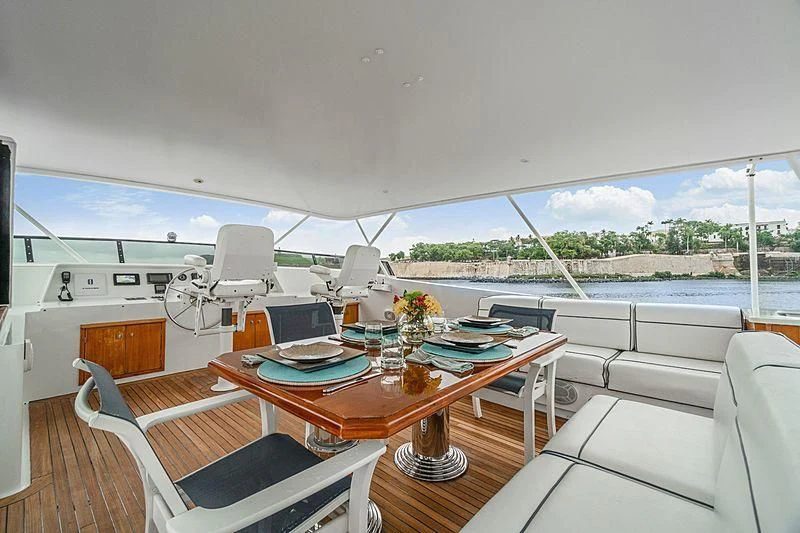 a table with a laptop on it aboard NIRVANA Yacht for Sale