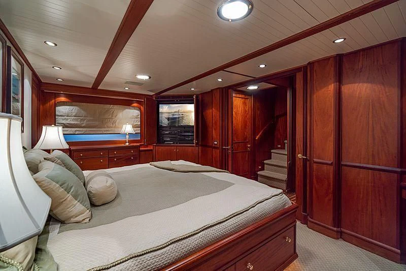a bed in a room aboard NIRVANA Yacht for Sale