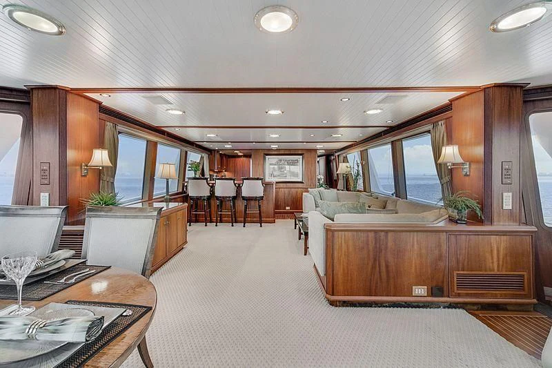 a large living room with a large open floor plan aboard NIRVANA Yacht for Sale