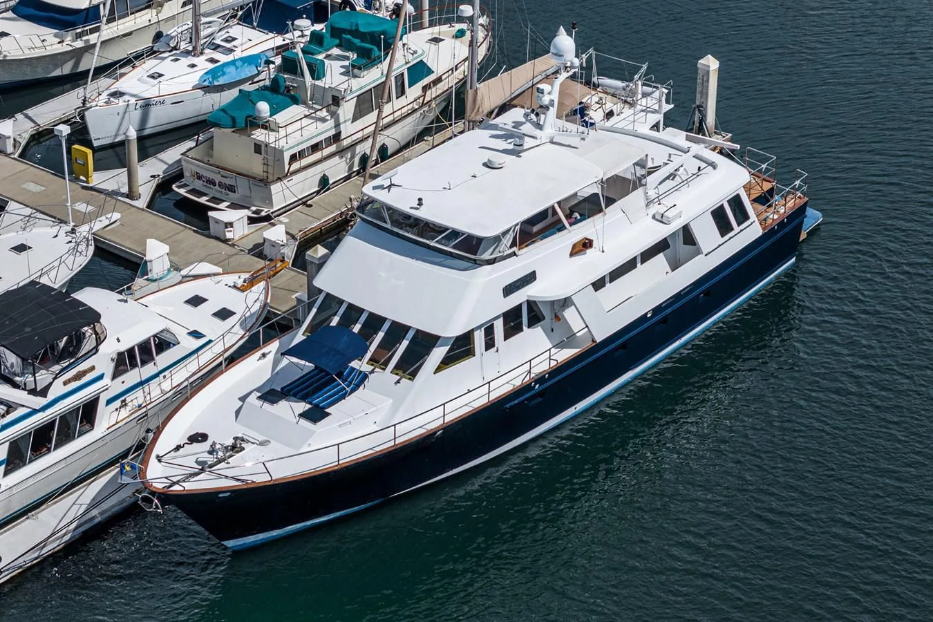 a large white boat in the water aboard NIRVANA Yacht for Sale