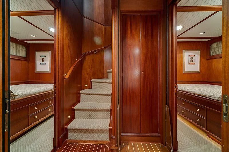 a wood door leading to a bedroom aboard NIRVANA Yacht for Sale