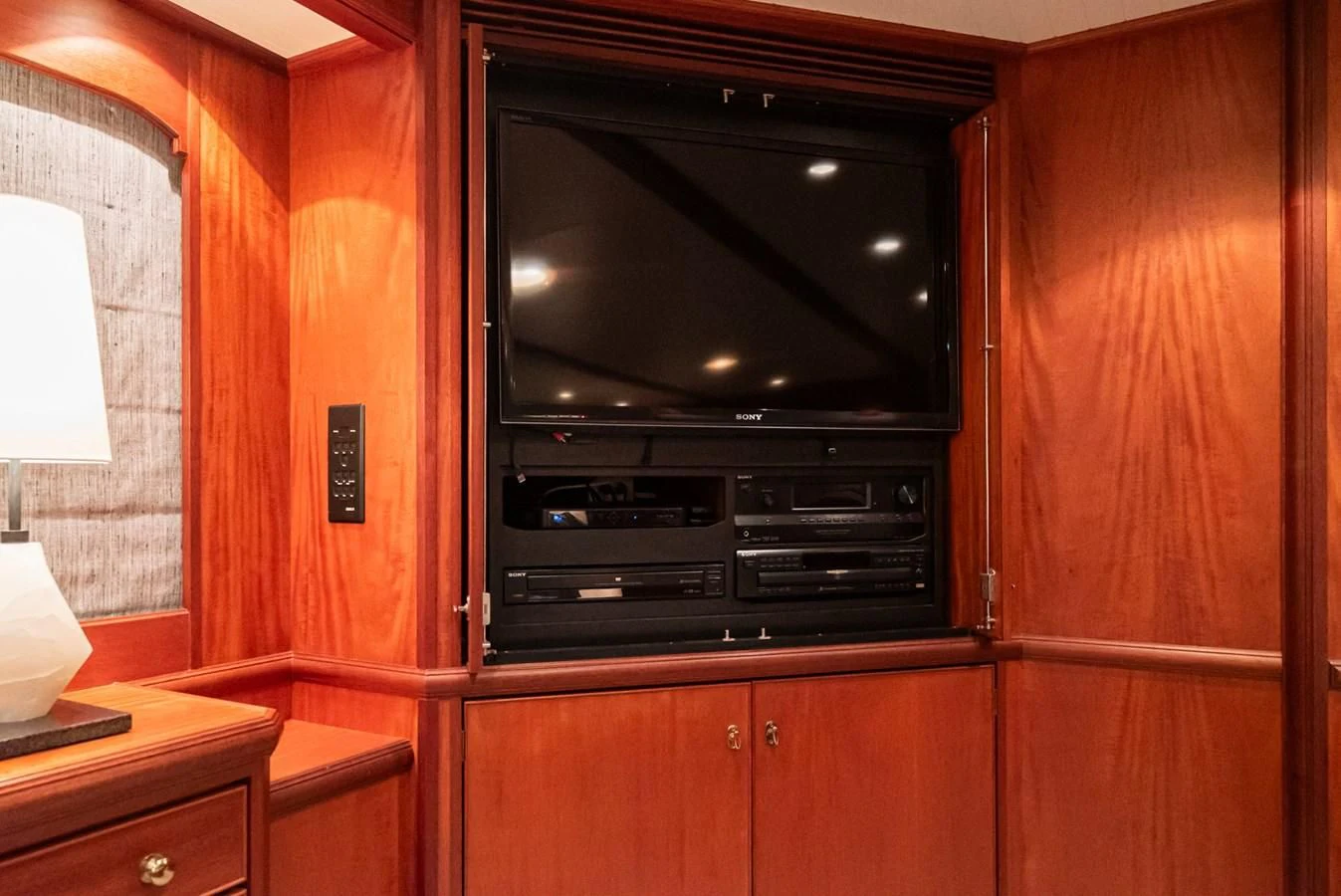 a tv on a cabinet aboard NIRVANA Yacht for Sale