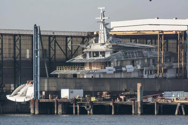 a large ship docked aboard BRAVO EUGENIA Yacht for Sale