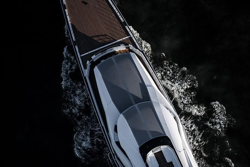 a car driving on a road at night aboard BRAVO EUGENIA Yacht for Sale