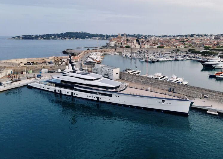 a large ship docked aboard BRAVO EUGENIA Yacht for Sale