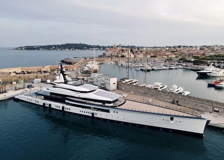 a large ship docked aboard BRAVO EUGENIA Yacht for Sale