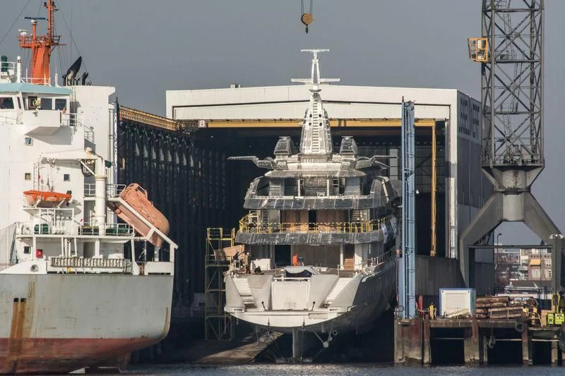 a large ship docked aboard BRAVO EUGENIA Yacht for Sale
