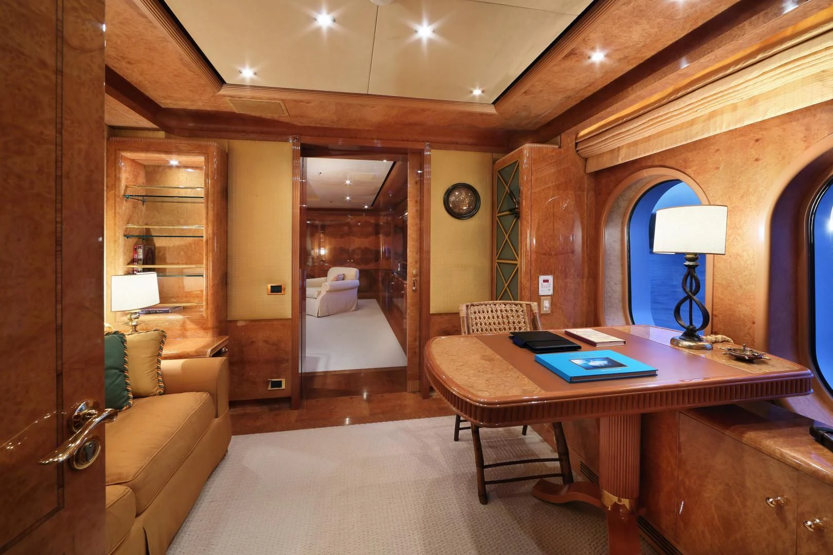 a room with a table and chairs aboard AQUA MARE Yacht for Sale