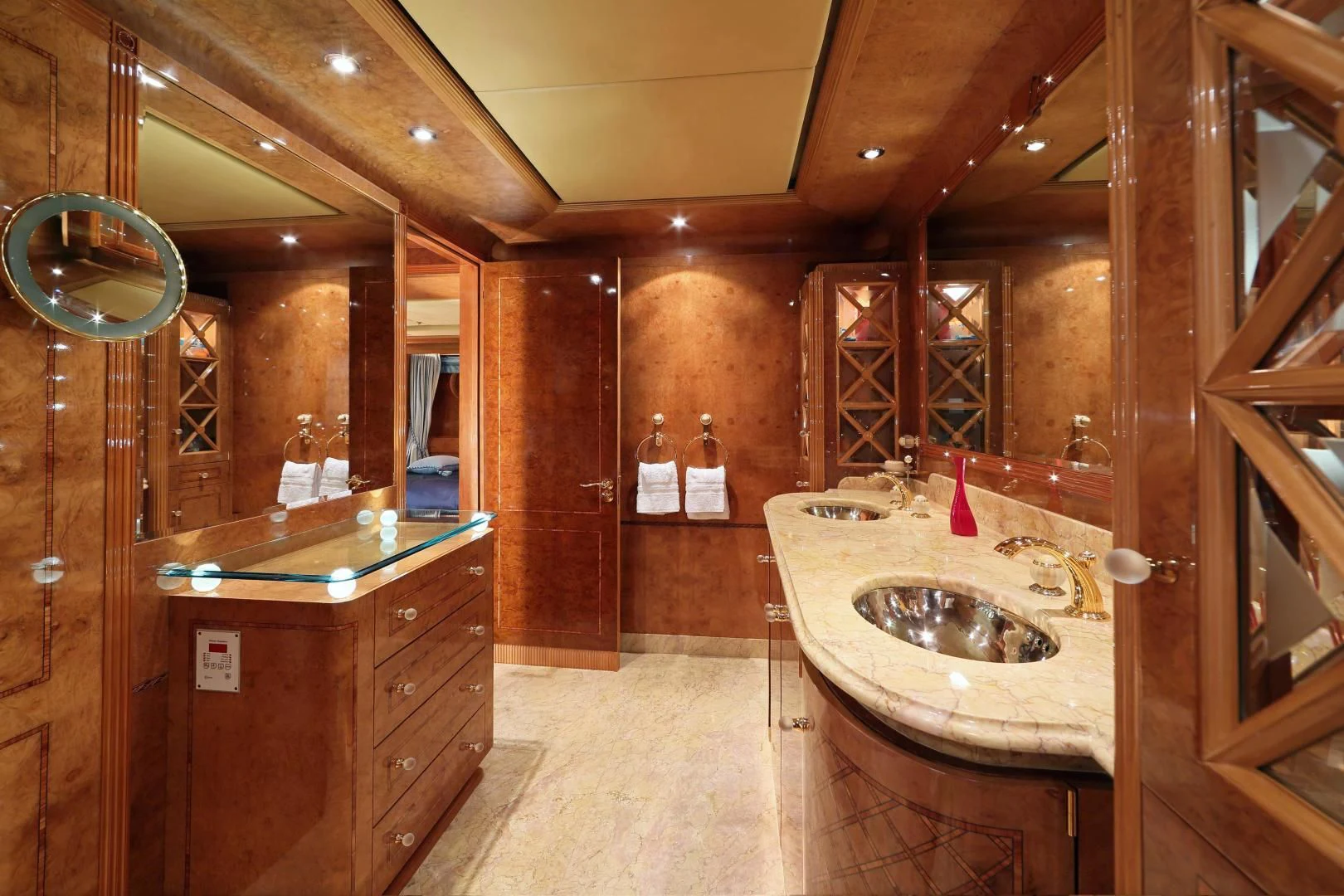 a bathroom with a sink and cabinets aboard AQUA MARE Yacht for Sale