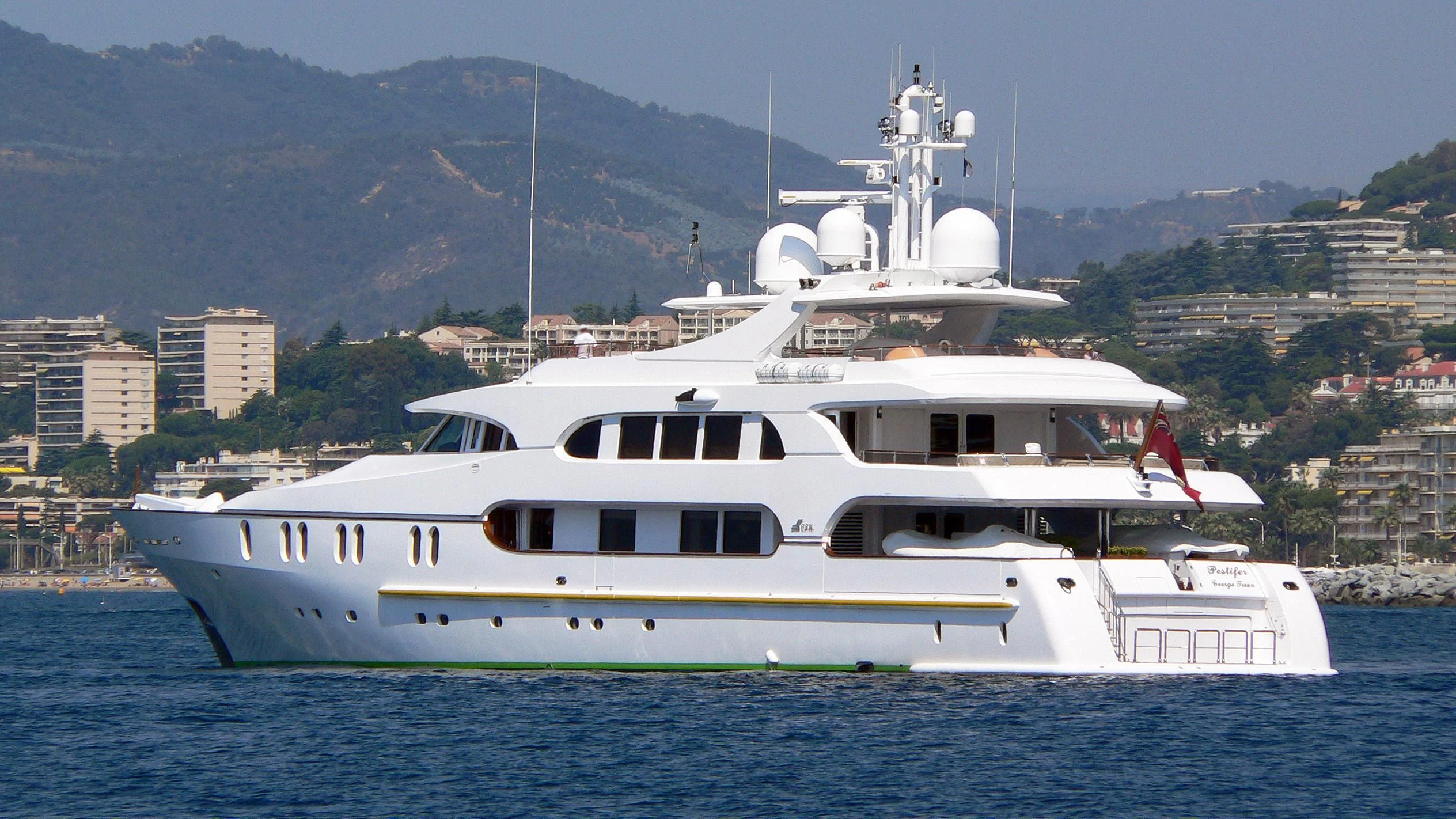 a white yacht in the water aboard AQUA MARE Yacht for Sale
