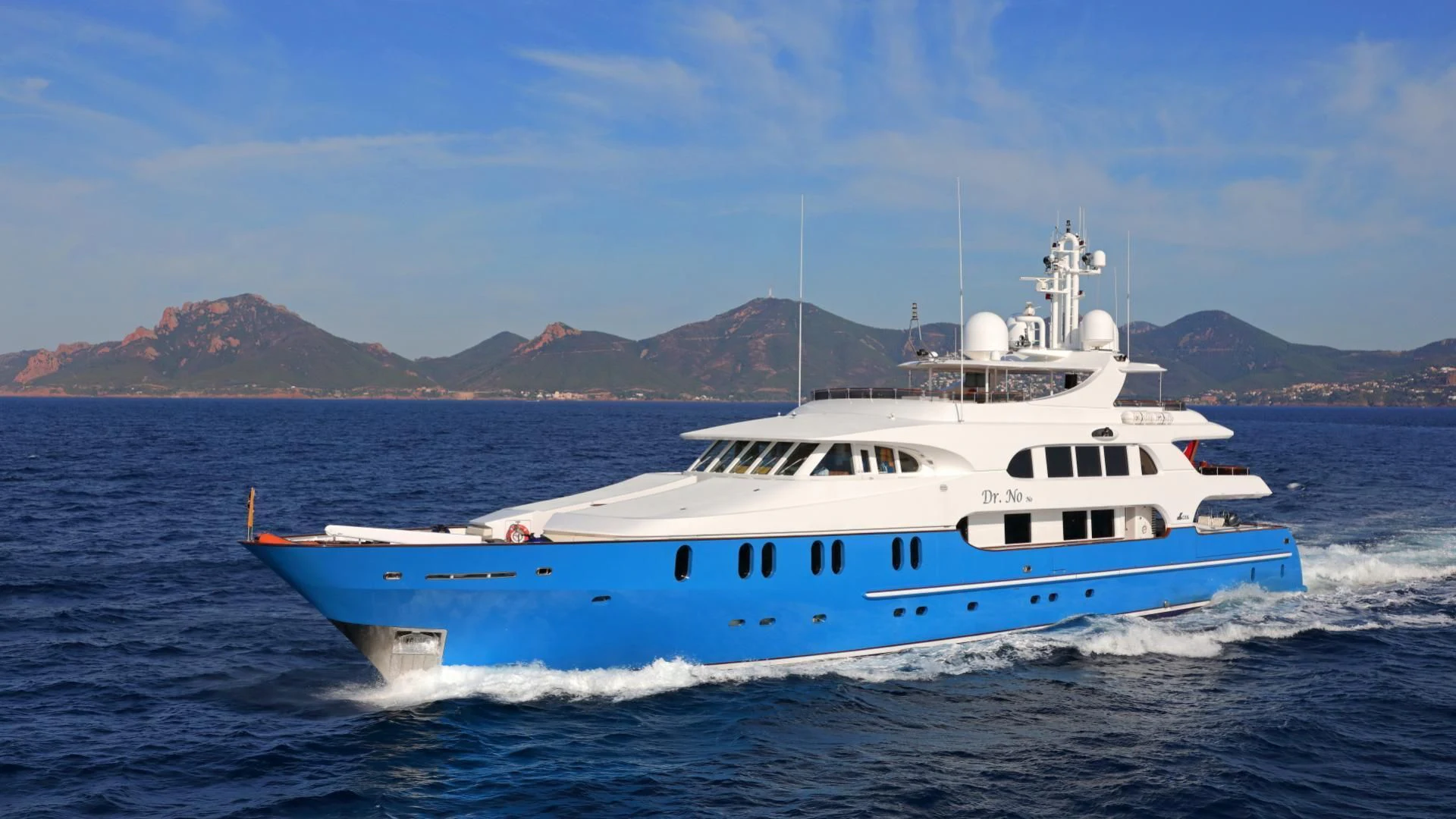 a white boat on the water aboard AQUA MARE Yacht for Sale