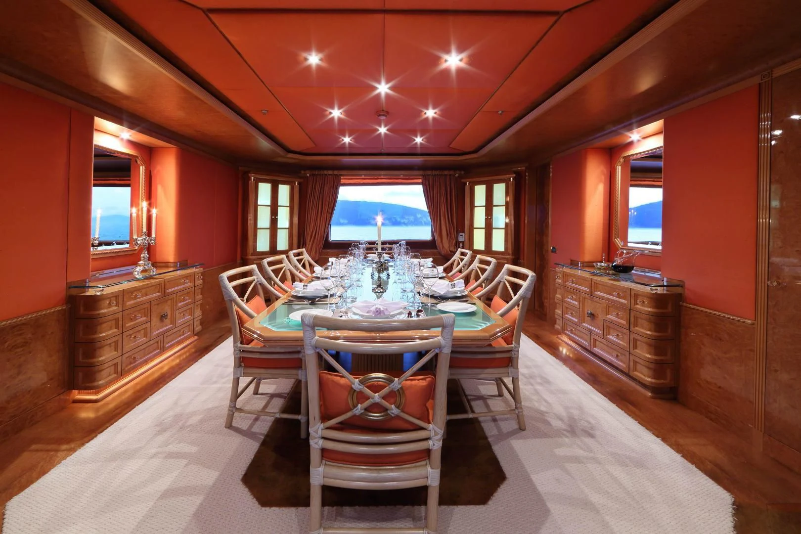 a dining room with a table and chairs aboard AQUA MARE Yacht for Sale