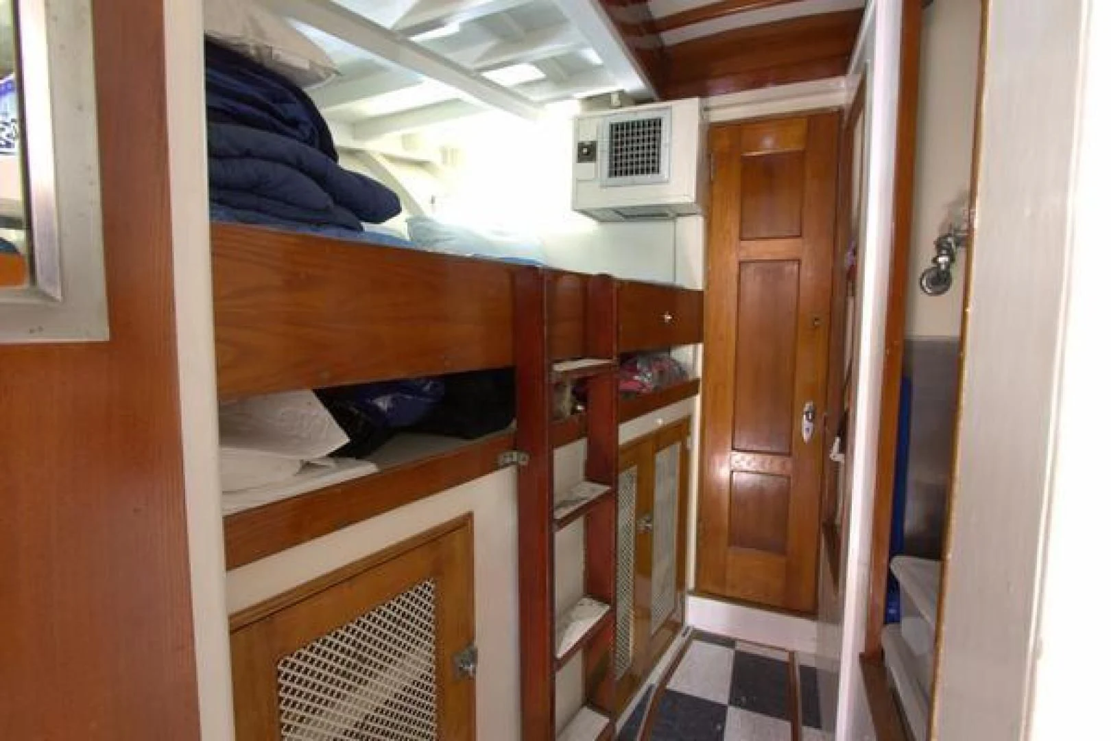 a room with bunk beds aboard LIBERTY LOVE Yacht for Sale