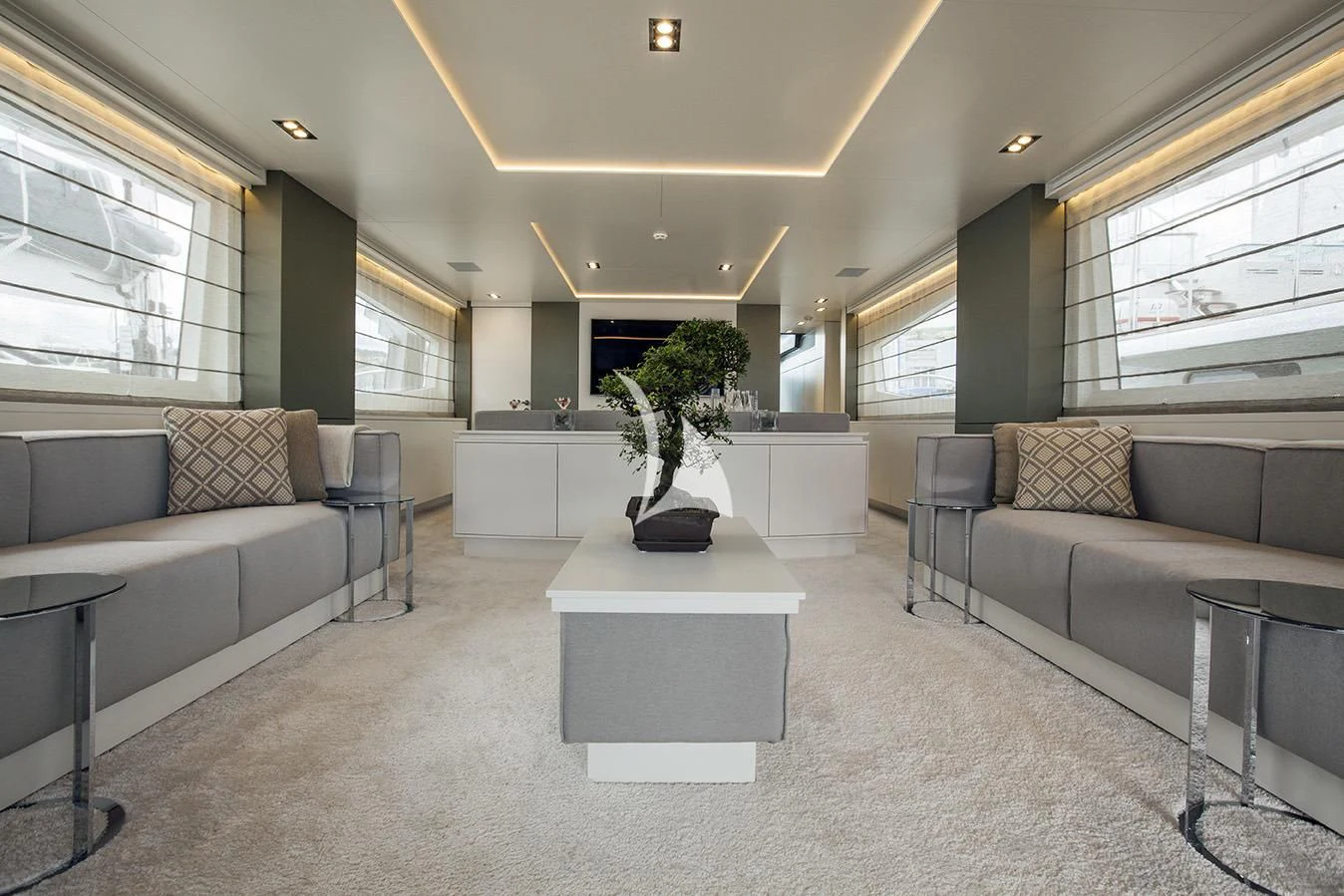 a living room with a couch and a table aboard MANATEA Yacht for Sale