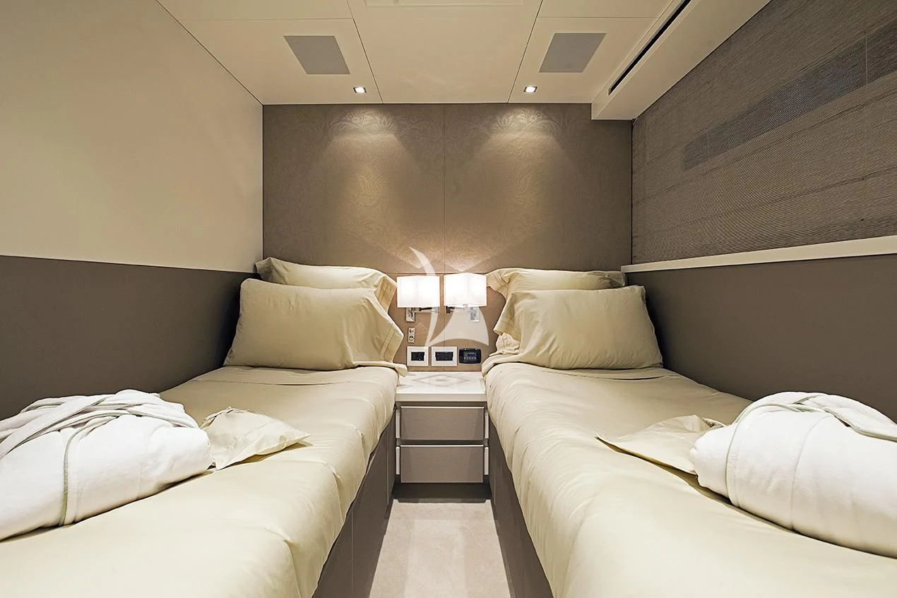 a room with two beds aboard MANATEA Yacht for Sale