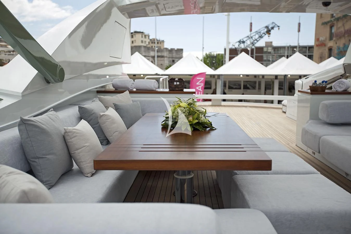 a room with a table and couches aboard MANATEA Yacht for Sale