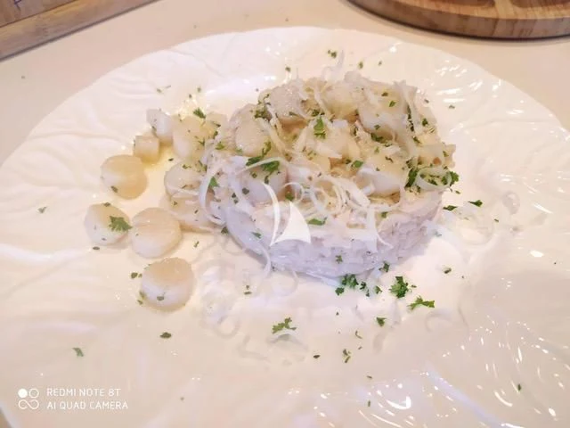 a plate of food aboard MANATEA Yacht for Sale