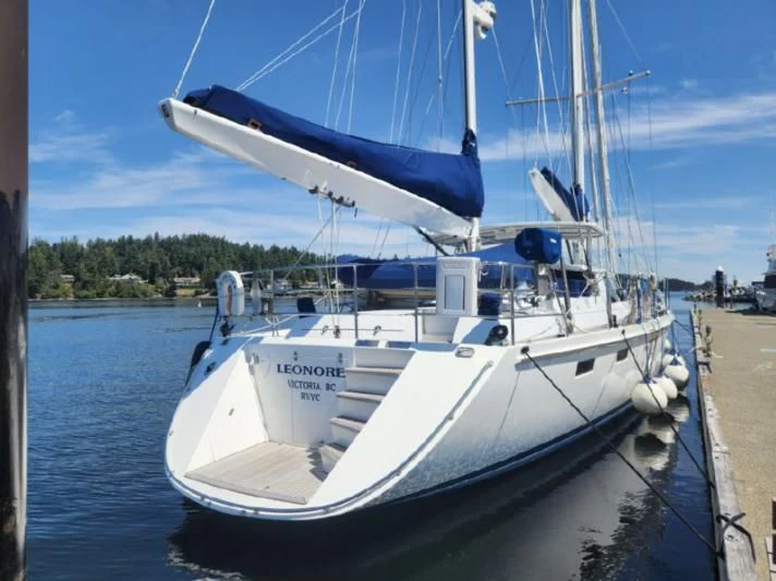 a boat docked at a pier aboard LEONORE Yacht for Sale