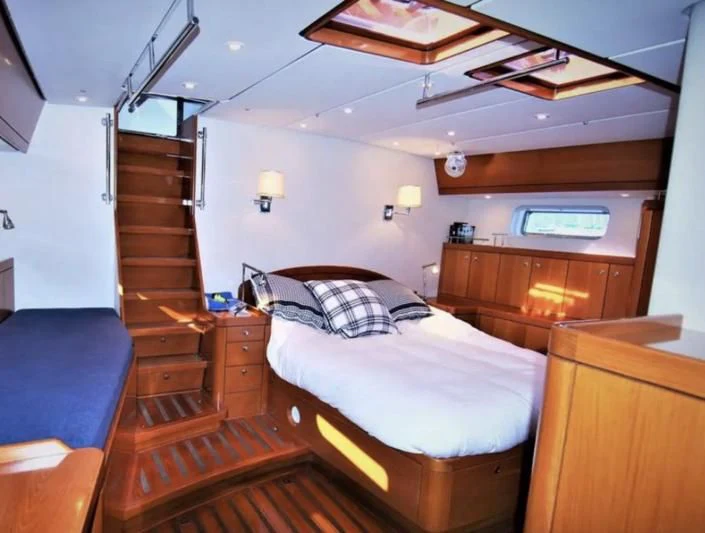 a bedroom with a bunk bed aboard LEONORE Yacht for Sale