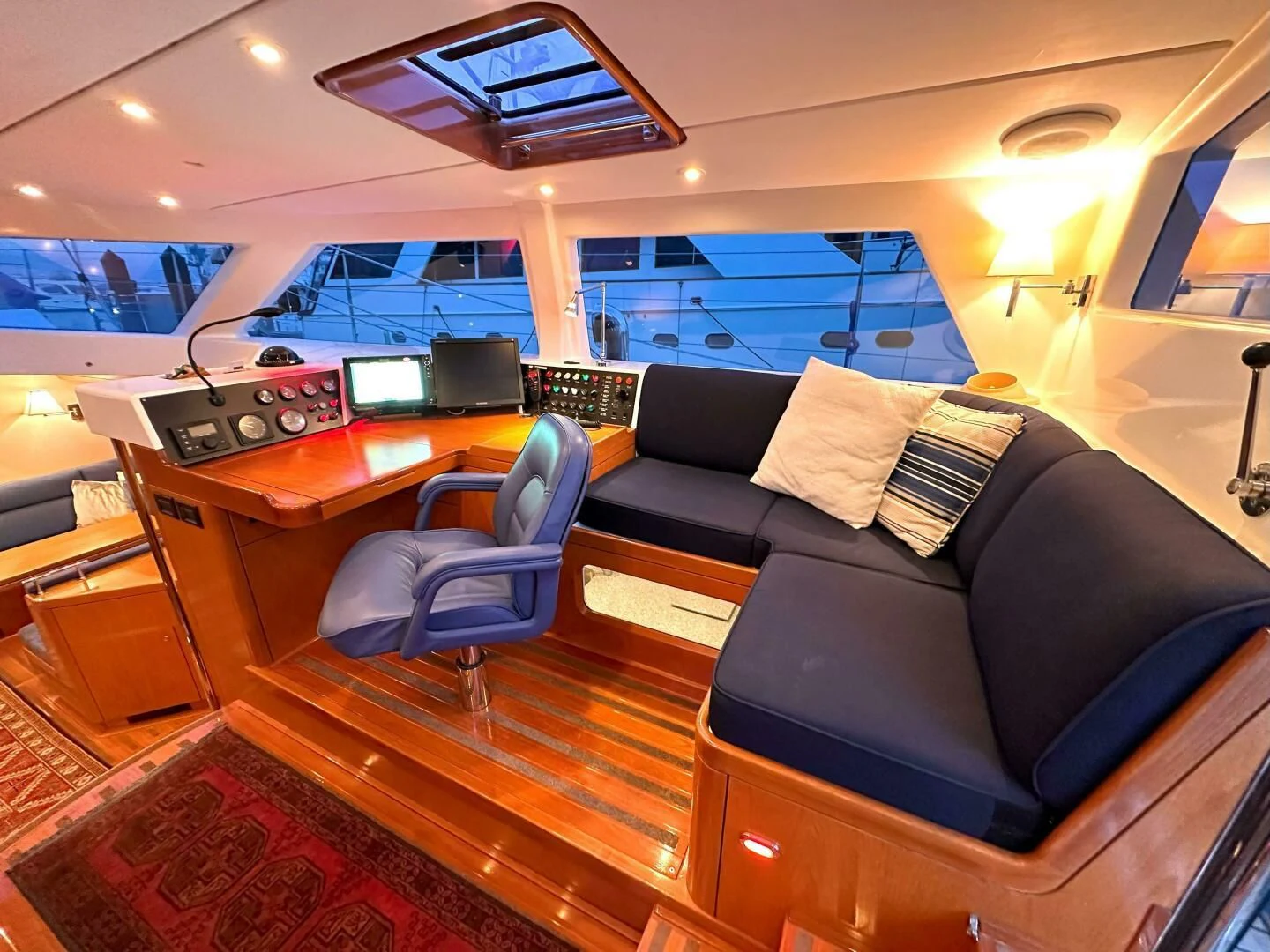 a room with a couch and a desk aboard LEONORE Yacht for Sale