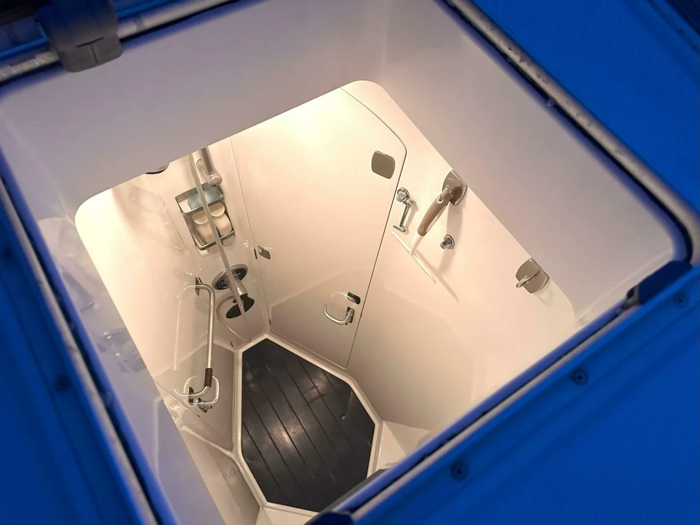 a bathroom with a glass shower aboard LEONORE Yacht for Sale