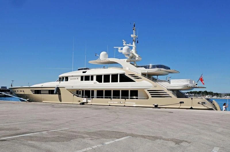 a large white boat aboard MUZA Yacht for Sale