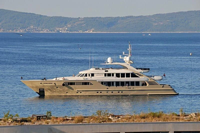a large ship in the water aboard MUZA Yacht for Sale