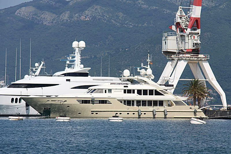 a large white boat in the water aboard MUZA Yacht for Sale