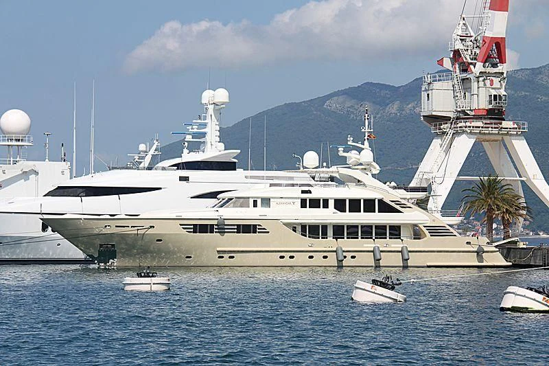 a large white boat in the water aboard MUZA Yacht for Sale