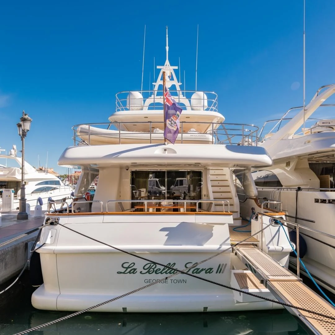 a boat docked at a pier aboard LA BELLA SARA III Yacht for Sale